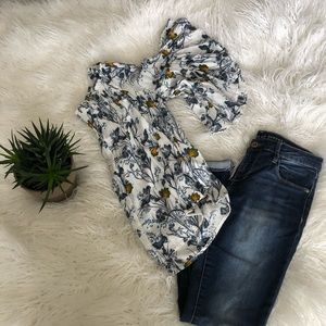 Off shoulder bell sleeved floral blouse